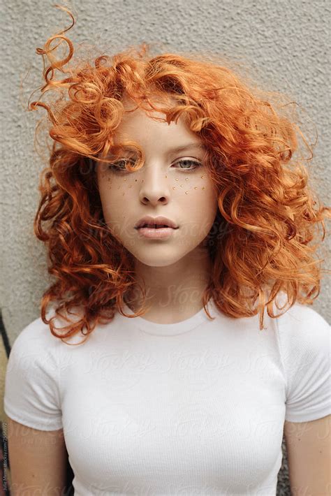 the portrait of the curly red hair girl by stocksy contributor julie meme stocksy