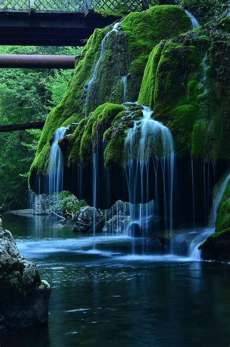 Time Lapse Photo Of Waterfalls In Mossy Rock Formation · Free Stock Photo