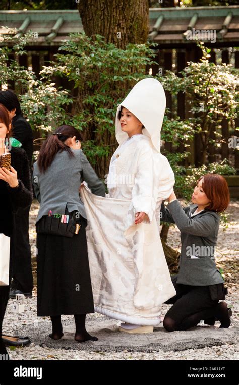 Shinto Bride Has A Team To Prepare Her Traditional Kimono For The