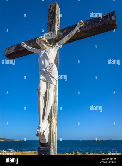 Statue Depicting The Crucifixion Of Jesus Christ Is A Small Seaside