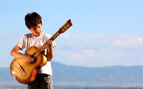 Boy Playing Guitar Stock Photo Image Of Objects Hold 20081048