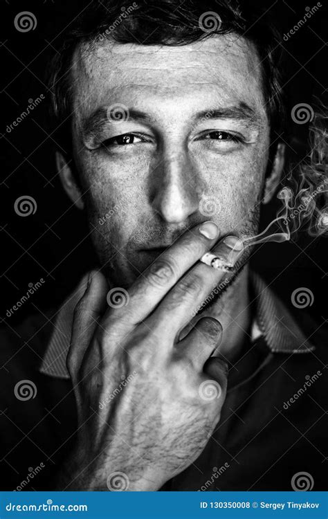Happy Man Smokes A Cigarette A Creative Portrait Of A Real Man A