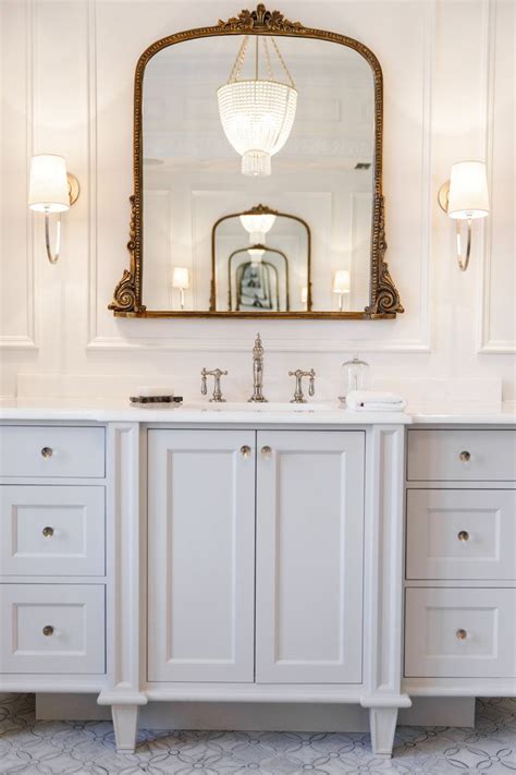 White Custom Vanity With Golf Vintage Mirror And Intricate Tile