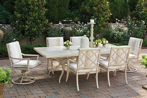 This expandable dining table is where practicality meets functionality. Tommy Bahama Outdoor - Misty Garden Rectangular Dining ...