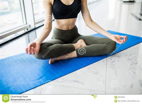 Yoga Girl Meditating Indoor And Making A Zen Symbol With Her Hand