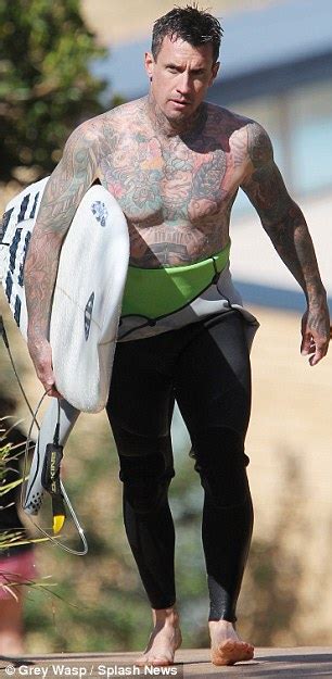 Carey Hart Shows Off His Extensive Body Art As He Joins Wife Pink And