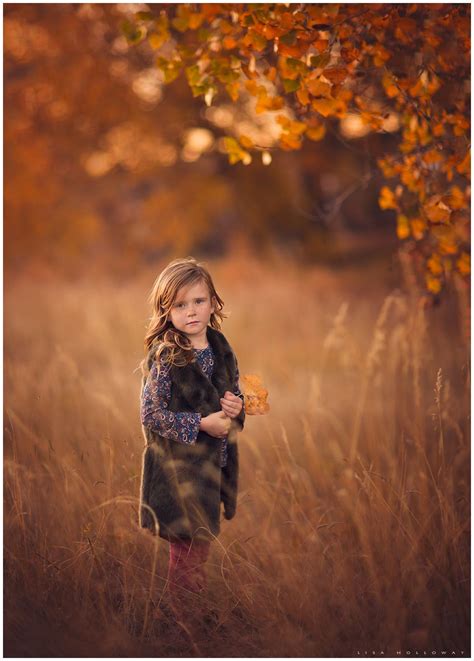Warm Autumn Portrait Of A Cute Little Girl With Freckles