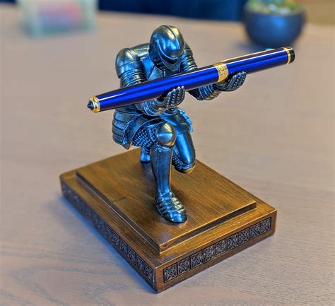 This Bowing Medieval Knight Pen Holder Deserves a Spot On Every Geeks Desk