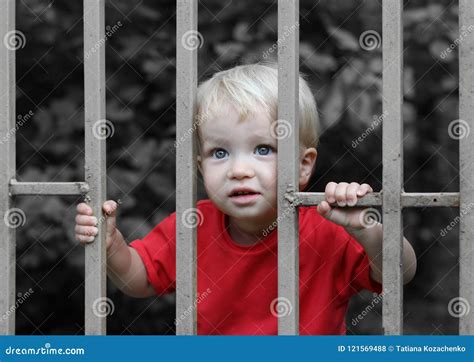 Crying Child Behind Bars Stock Photos Free And Royalty Free Stock