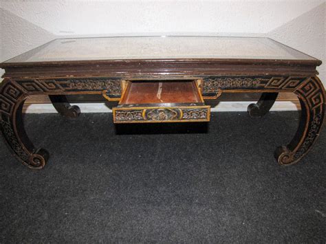 Solid ash legs finished in walnut stain highlight a distinctive, abstract sculpted frame. Fancy Hand Carved Japanese Coffee Table with Drawer ...