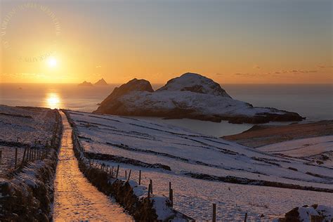 Amazing Winter Sunset Over Snowy Puffin Island And Skelligs County