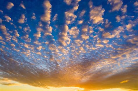 Orange Sunset With Clouds And Blue Sky Above Stock Photo Image Of