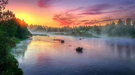 Misty River Sunrise Wallpaper Backiee