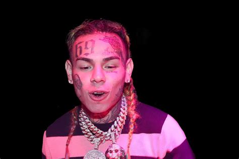 6ix9ine arrest footage shows crowd cheering as rapper hauled off in handcuffs allhiphop