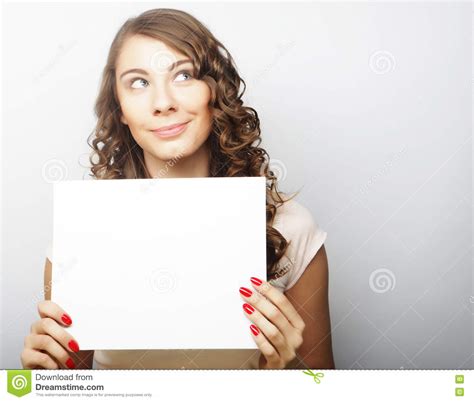 Smiling Young Casual Style Woman Showing Blank Signboard Stock Image
