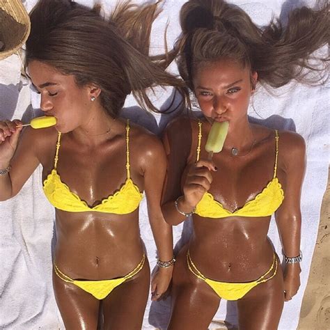 Two Tanned Girls With Ice Lollies Scrolller
