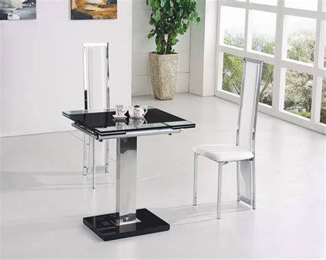 I love glass dining tables. Gami Extending Glass Dining Table, Dining Table and Chairs ...