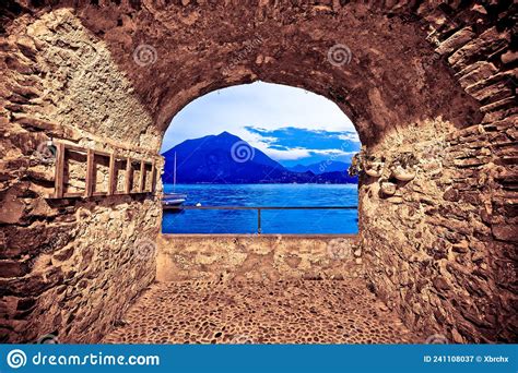 Como Lake Lakefront Evening View Through Stone Window In Town Of