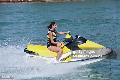 woman on jet ski photos and premium high res pictures getty images
