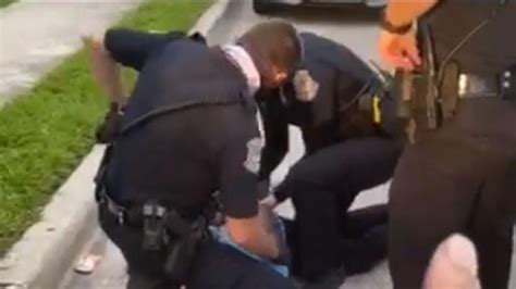 Florida Cop Put On Leave After Pinning Down Black Mans Neck