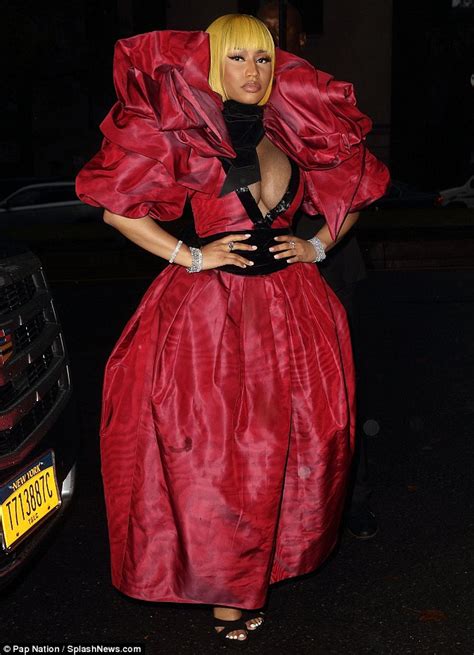 Nicki Minaj Flaunts Her Ample Cleavage In Bold And Dramatic Frock For
