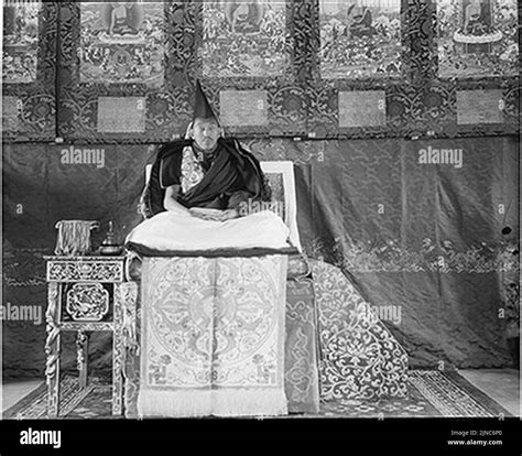 The 13th Dalai Lama Sitting On A Throne At Norbulingka In 1921 Stock