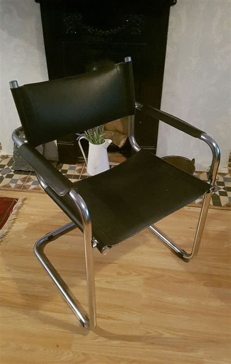 Set of six time capsule quality vintage chrome dining chairs by cidue. Vintage mid century black leather and chrome directors ...