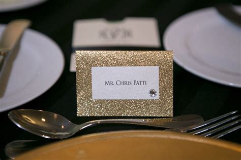 Gold Glitter Wedding Place Card On Black Linens Black And Gold Wedding