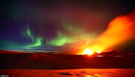 Northern Lights And Erupting Icelandic Volcano Produce Stunning