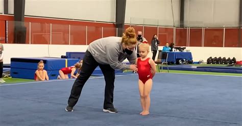 tiny gymnast s struggle in routine melts 18m hearts