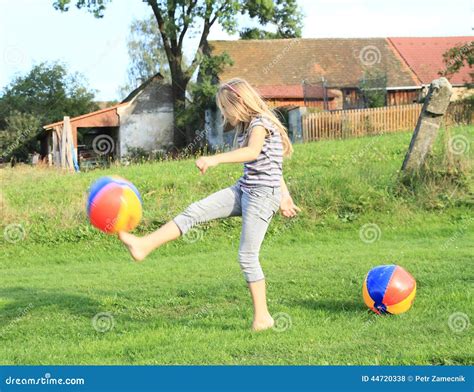 Girl Kicking Inflating Balls Stock Photo Image 44720338