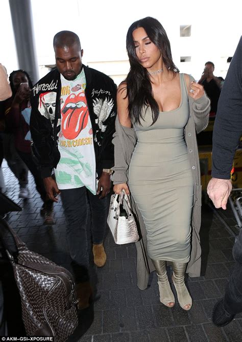 Kim Kardashian In Eye Popping Dress As She Departs For Paris With Kanye West Daily Mail Online