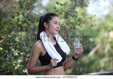 Fitness Beautiful Woman Drinking Water Sweating Stock Photo 1913048797