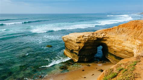 Everything You Need To Know About Sunset Cliffs Cave Getaway Couple
