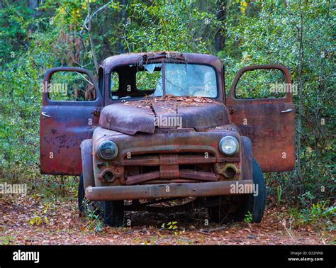 Old Rusty Broken Down Junk Trucks Stock Photo Alamy