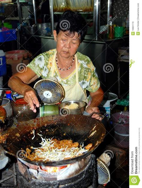 By this method, the food is fried in order to. Georgetown, Malaysia: Woman Cooking With Wok Editorial ...