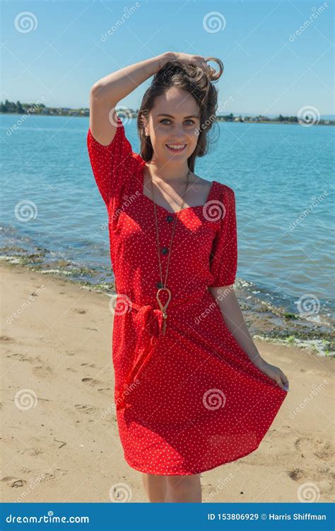 Brunette In Red On A Beach Stock Image Image Of Attractive 153806929