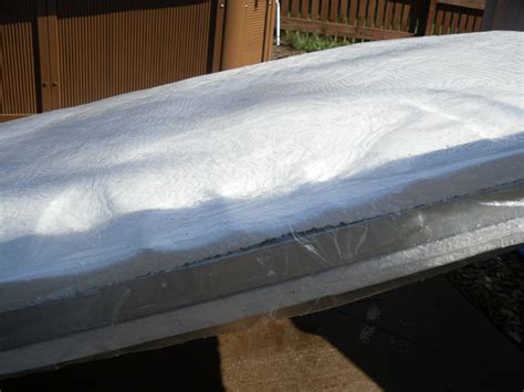 My hot tub cover began dipping into the water due to the foam inside being broken. Can hot tub covers melt? | Hot Tub Cover Pros