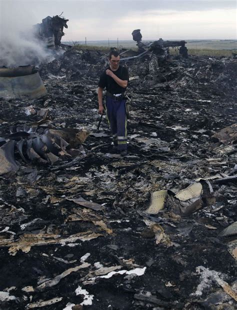 Mh17 mh17 crash introduction the crash of flight mh17 on 17 july 2014 shocked the world and caused hundreds of families much grief. Malaysia Airlines MH17 Shot Down: Devastating Images of the Plane Crash PHOTOS