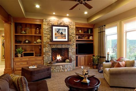 20+ Living Room with Fireplace That will Warm You All ... A curved fireplace decorate in brass and nature.
