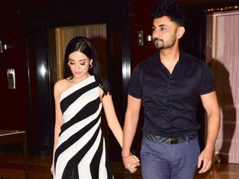 She shared what attracted her towards him and her reaction when he had proposed to her. Photo: Amrita Rao smiles as she walks hand-in-hand with ...