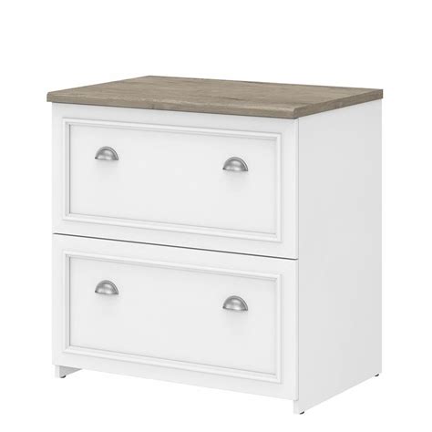 This file cabinet represents a classic, neutral style thanks to its wooden construction in a white finish. Fairview 2 Drawer Lateral File Cabinet in White and Gray ...