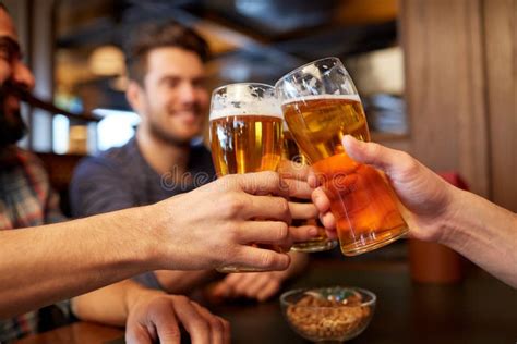 Happy Male Friends Drinking Beer At Bar Or Pub Stock Photo Image Of