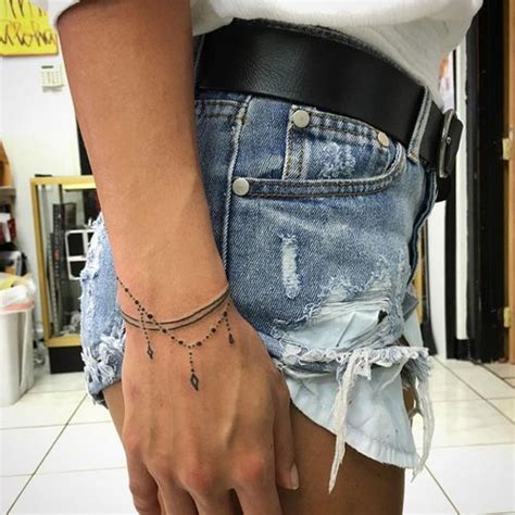 It is a simple, stylish and statement making idea. Fed onto Wrist tattoos Album in Tattoos Category | Wrist ...