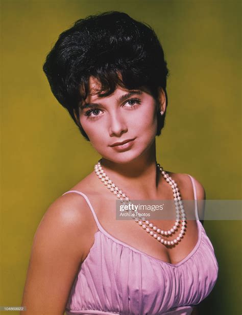 a portrait of american actress suzanne pleshette wearing pearls and a suzanne pleshette