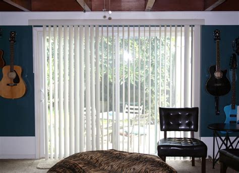 Hang curtains over vertical blinds. Hanging Curtains on a Vertical Blind Track | Vertical blinds curtains, Curtains with blinds ...