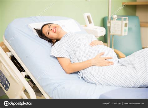 Woman Getting Labor Contractions Stock Photo By Tonodiaz