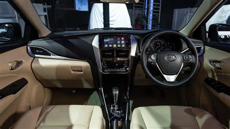 Price details, trims, and specs overview, interior features, exterior design, mpg and mileage capacity, dimensions. Toyota Yaris interior