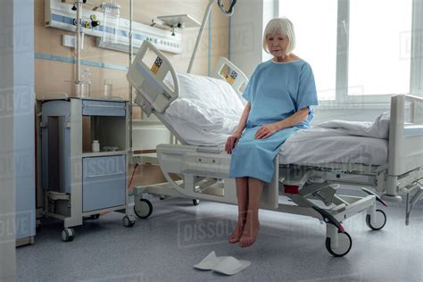 Hospital Patient In Bed Alone