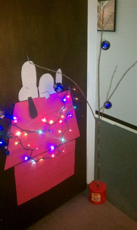 Placing a christmas wreath on the front door of a home is not a new idea. office door christmas decorating contest | 2011 Door ...
